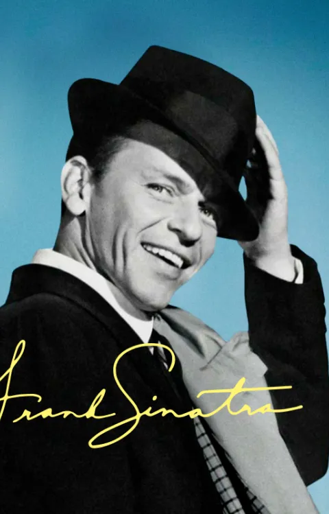 Frank Sinatra med svart hatt och stort leende