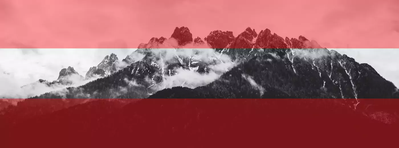 Naturbild med Österrikes flaggas färger