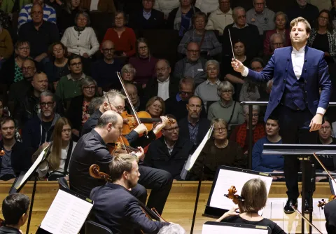 Bild över orkestern och konsertsalen, tagen från körläktarplats