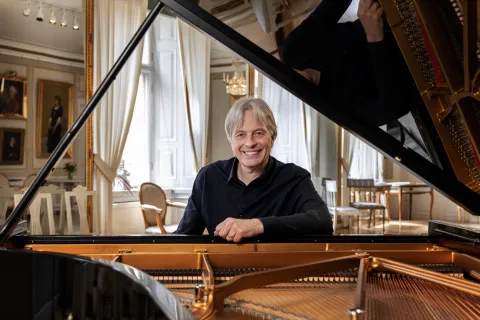 Image of person sitting down