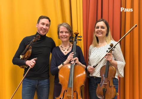 Three people with instruments