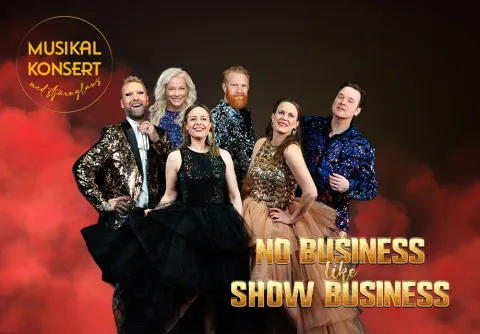 Mörk bild med flera medverkande i bild runt röd rök. No business like Show Business på Malmö Live Konserthus 2027