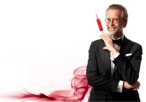 Henrik Widegren med spruta i handen