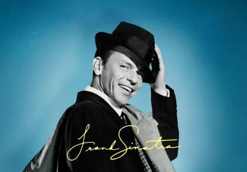 Frank Sinatra med svart hatt och stort leende
